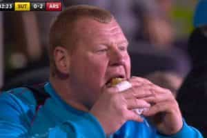 Wayne Shaw eating a pie