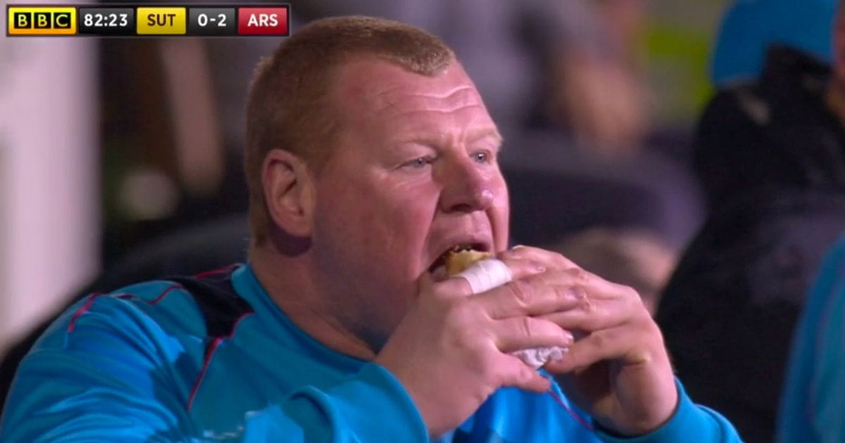 Wayne Shaw eating a pie