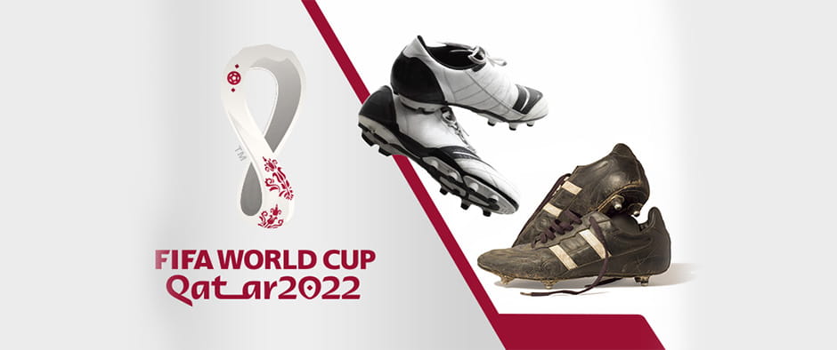 A picture of new and old football boots with the Qatar World Cup logo shown.