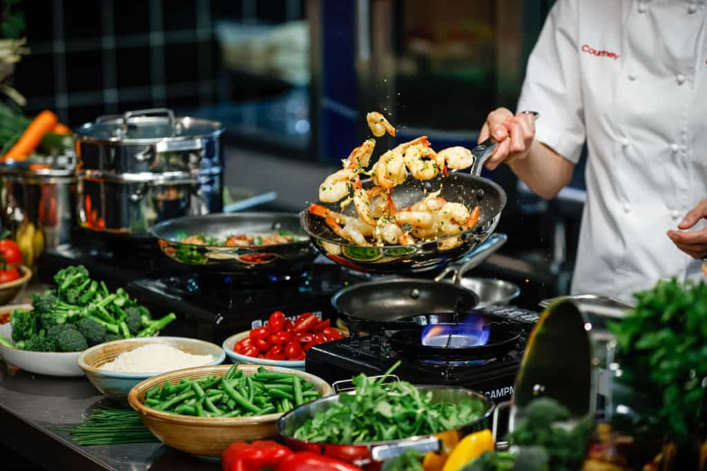 Prawns being fried in the kitchen.