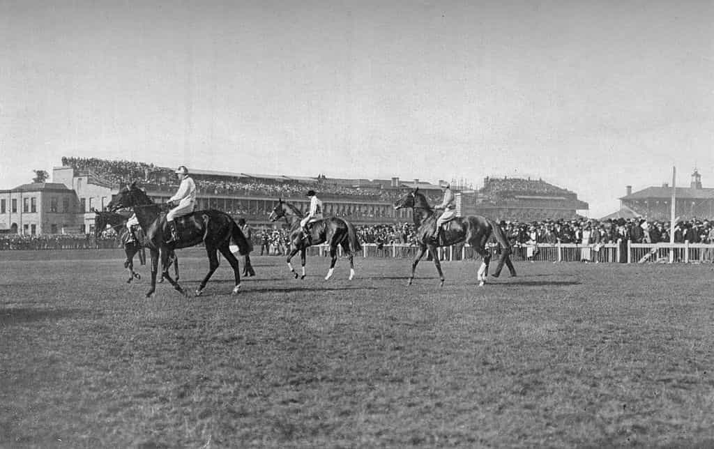 Horses circle at the start of a 1901 Doncaster race.