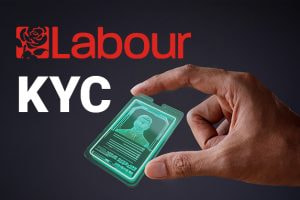 A hand holding a glowing, futuristic ID card with a digital image, next to the Labour Party logo and the text "KYC" on a dark background.