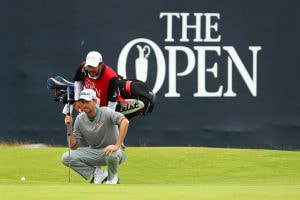 Webb Simpson lines up a putt on the 18th green during the 145th Open Championship at Royal Troon.