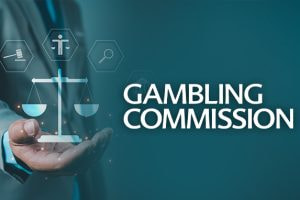 A person in a suit holding a balanced scale icon with the text 'Gambling Commission' beside it. The background includes various icons related to justice and regulation.