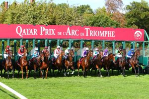 Starting stalls bursting open in the Prix de l’Arc de Triomphe.