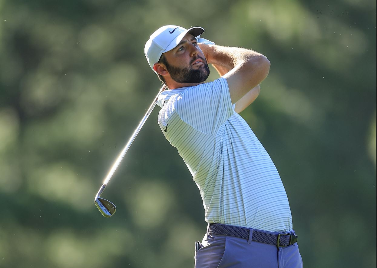 Scottie Scheffler playing a shot on the 14th hole during the third round of the 2024 Masters.