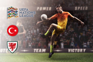 UEFA Nations League image for Türkiye vs Wales, featuring team logos and a footballer controlling the ball on a field with a stadium crowd in the background