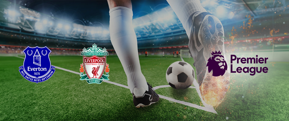 An action-packed football-themed image featuring a player about to kick a ball on a vibrant green pitch inside a stadium. The image includes the logos of Everton and Liverpool alongside the Premier League logo, emphasising the Merseyside Derby clash.