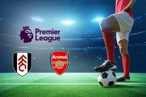 A football player in red and white kit stands on a pitch with a ball at their feet. The Premier League logo is visible, alongside the Fulham and Arsenal club logos, in a stadium setting.